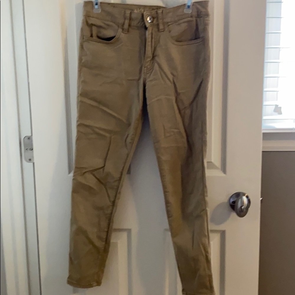 Khaki skinny pants.